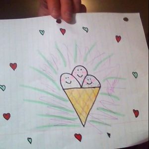 a ice cream cone with cute faces